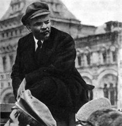 Lenin sitting in the lorry which made an improvised speaker's platform 

        for him at the Vsevobuch parade. 1919