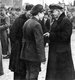 Lenin in Red Square speaking with V. M. Zagorsky, Secretary of the Moscow 

        Party Committee. 1919.