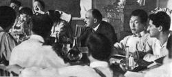 Lenin at a meeting of one of the commissions of the Second Congress 

        of the Comintern